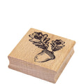 Le Stempel Eichel d'Artoz Papier AG représente un gland noir et deux feuilles de chêne gravées sur le dessus - un tampon en bois idéal pour le Bastelarbeiten et les projets créatifs.