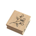 Der Stempel rote Beeren von Artoz Papier AG zeigt ein schlichtes schwarzes Liniendesign mit Zweig, Blättern und roten Beeren - perfekt geeignet für Bastelarbeiten.