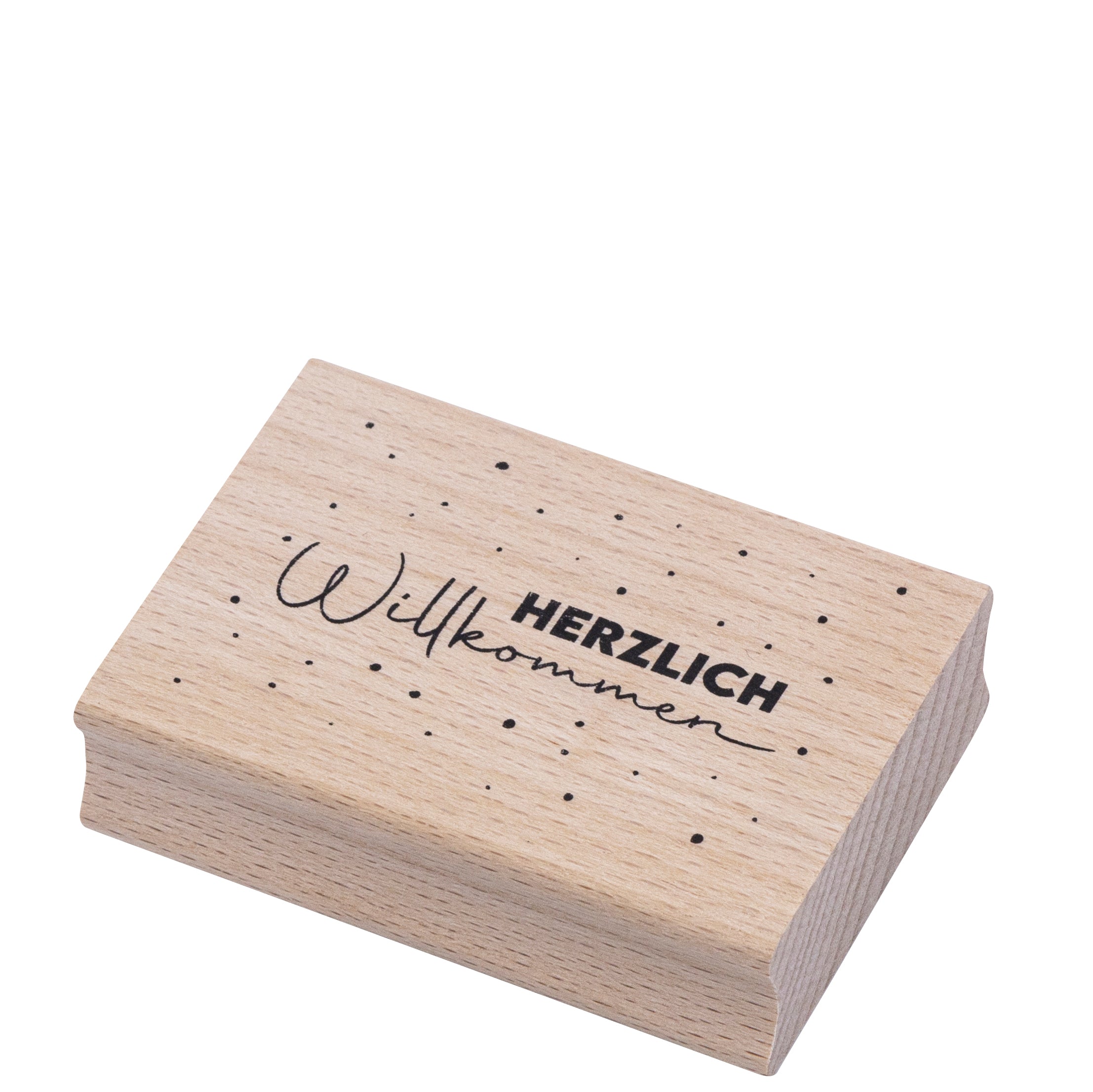 Der Stempel Herzlich Willkommen von Artoz Papier AG ist ein rechteckiger Stempel mit dem Schriftzug "Herzlich Willkommen" und kleinen schwarzen Punkten, ideal für Bastelarbeiten und kreative Projekte.