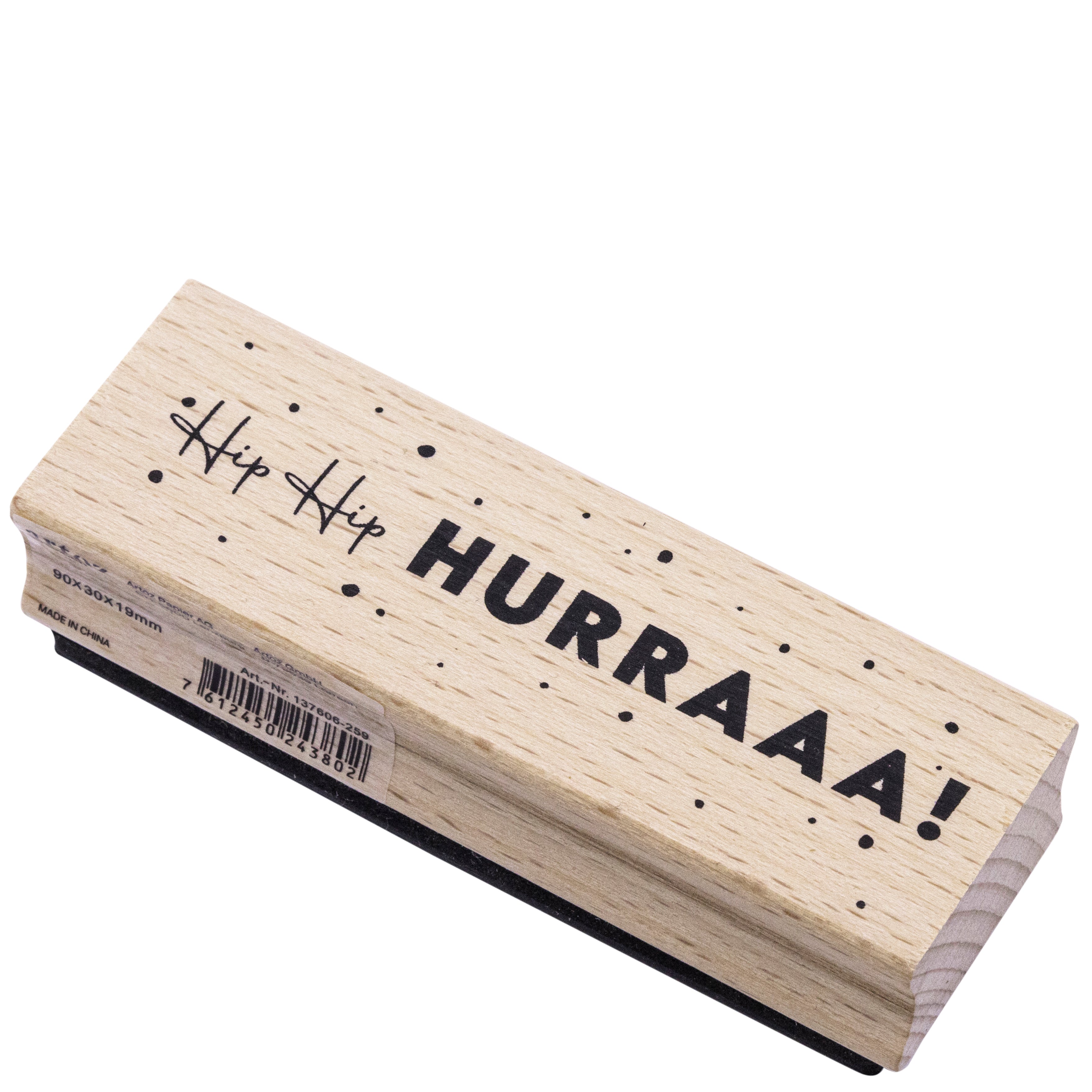 Der Artoz Papier AG Stempel Hip Hip Hurra mit schwarzem Text und festlichen Punkten, ideal für Bastelarbeiten oder Einladungskarten. Inklusive Barcode-Etikett an der Seite.