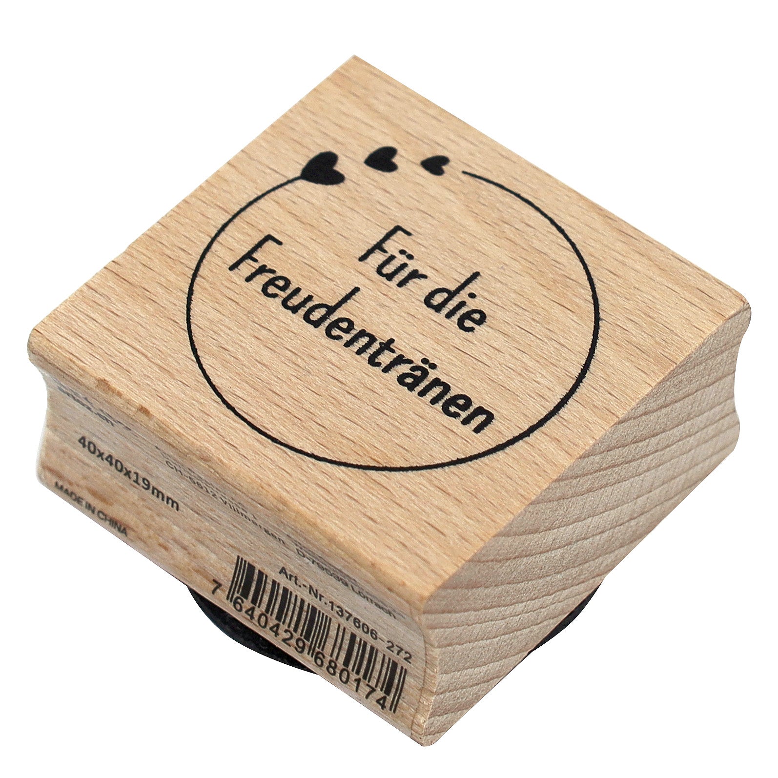 Der Stempel Kreis mit Text von Artoz Papier AG ist ein Holzstempel mit einem kreisförmigen Design, zwei kleinen Herzen und dem deutschen Text "Für die Freudentränen". Ideal für Bastelarbeiten, dieser Holzstempel misst 40x40x29mm.
