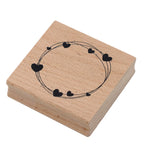 Le Stempel Kreis mit Herz d'Artoz Papier AG présente un motif circulaire de cœurs noirs reliés par de fines lignes - idéal comme Motivstempel Herz pour Bastelarbeiten.
