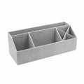 Der Artoz Papier AG Tisch Organisator ist ein hellgrauer Stoff-Tischorganizer in Leinenoptik mit fünf Fächern zum Sortieren von Stiften, Papier und Vorräten - ideal für Home-Office-Einrichtungen und auf weißem Hintergrund abgebildet.