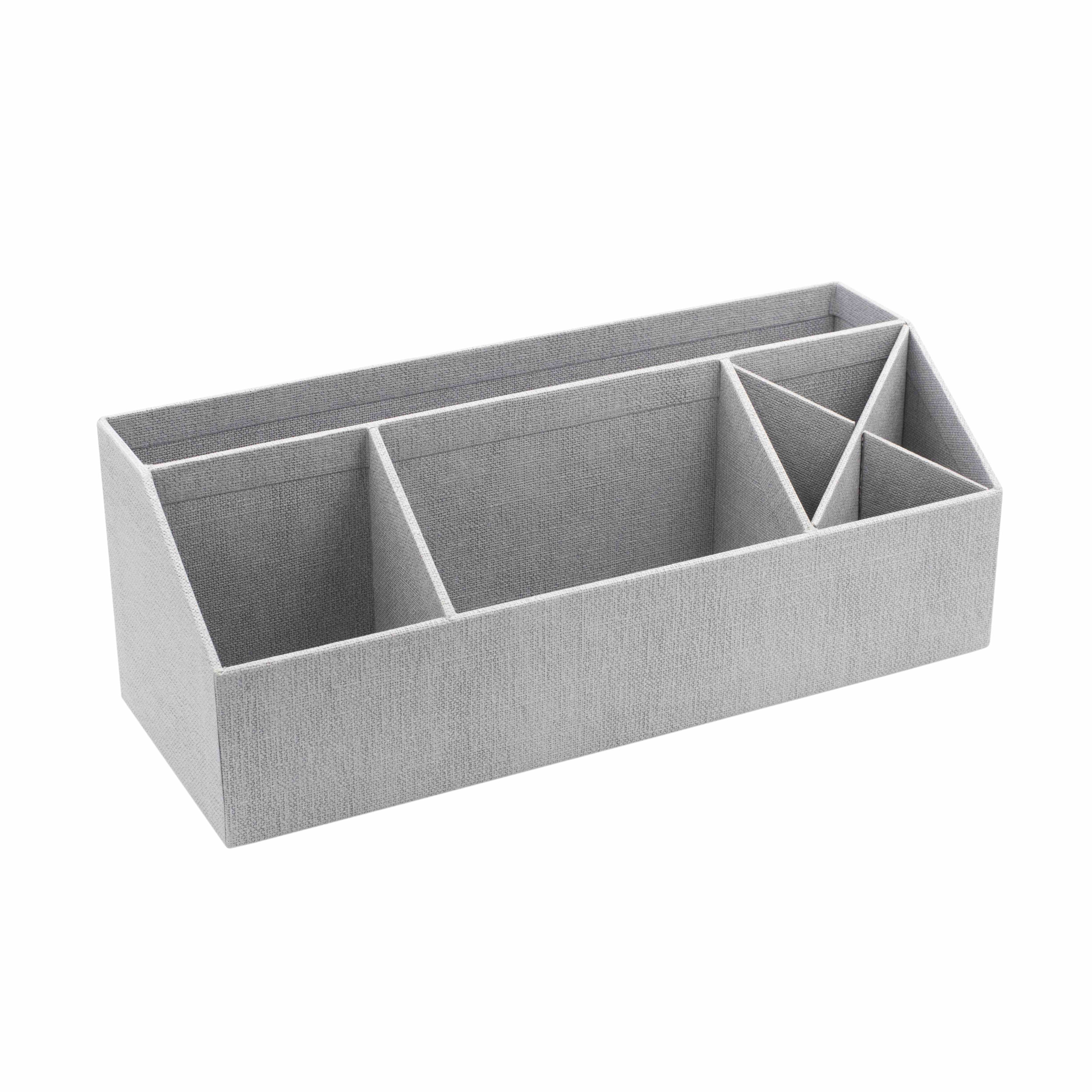 Le Artoz Papier AG Tisch Organisator est un organisateur de bureau en tissu gris clair en Leinenoptik avec cinq compartiments pour trier les stylos, le papier et les fournitures. Il est idéal pour les bureaux à domicile et est présenté sur un fond blanc.