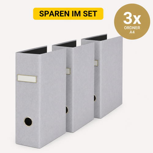 Drei graue Artoz Papier AG 3er Set Ordner A4 stehen nebeneinander. Oben steht auf einem gelben Banner "SPAREN IM SET", während auf der rechten Seite ein goldener Kreis "3x ORNDER A4-ideal für Ihre Home-Office-Ausstattung" anzeigt.