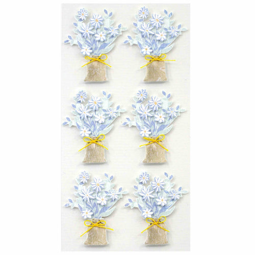 Six bouquets de fleurs blanches et bleu clair avec des feuilles vertes, chacun noué avec un ruban jaune, sont disposés en deux colonnes. L'autocollant 3D "Blumenstrauss" d'Artoz Papier AG ajoute l'élégance du Schweizer Design.
