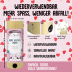 Eine lebendige Infografik stellt die Tischbombe ohne Feuer - Muttertag von Artoz Papier AG vor, mit einfachen Schritten, Top-Features (wiederverwendbar, sicherer Inhalt, individuell gestaltbar) und rosa Herzen neben fetten deutschen Texten zum Muttertag.