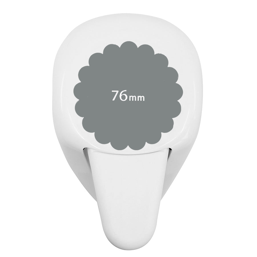 La perforatrice Artoz Papier AG Stanzer L Wellen-Kreis est une perforatrice blanche de 76 mm avec un cercle festonné gris - idéale pour les projets de Karten basteln et de Scrapbooking.