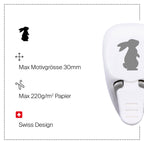 La Stanzer S Hase d'Artoz Papier AG crée des découpes de 30 mm en forme de lapin. De conception suisse et compatible avec du papier jusqu'à 220g/m², elle est parfaite pour les projets créatifs. Les icônes de lapin et de ciseaux sont représentées.