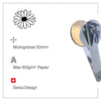 Tampon à gaufrer de rechange « Sujet Blume » de la marque Artoz Papier AG : un tampon à gaufrer en métal orné d'un motif de marguerite (Motivprägestempel) d'un diamètre de 50 mm, adapté au papier jusqu'à 160 g/m², et arborant l'icône du design suisse, le tout sur fond blanc.