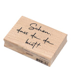 Le tampon Artoz Papier AG Stempel "schön dass du da bist" est un tampon rectangulaire avec la phrase allemande en caractères noirs - idéal pour Bastelarbeiten et pour ajouter une touche spéciale à vos travaux d'artisanat.