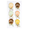 Lot de six autocollants Artoz 3D "Ballon Happy Birthday" par Artoz Papier AG. Chaque autocollant ovale représente le mot "Happy Birthday" en blanc ou en or, un bouquet floral, et se décline dans des tons pastel et terre : crème, marron, sarcelle, rose, marron foncé et jaune.