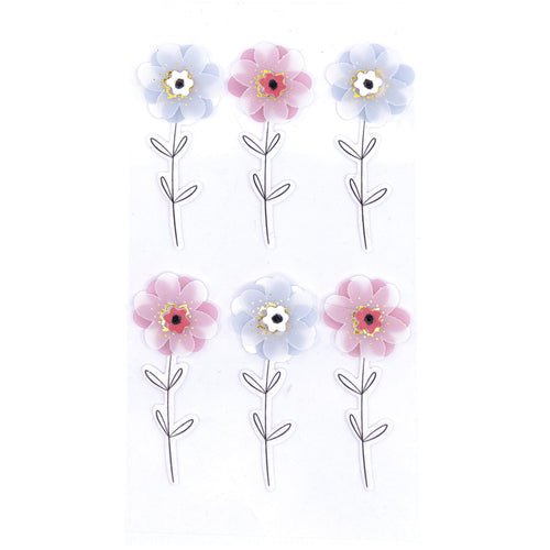 Six autocollants Artoz 3D "Blume" d'Artoz Papier AG, disposés en deux rangées de trois, présentent des pétales roses ou bleus, des centres jaunes et des tiges/feuilles noires et blanches sur un fond blanc.