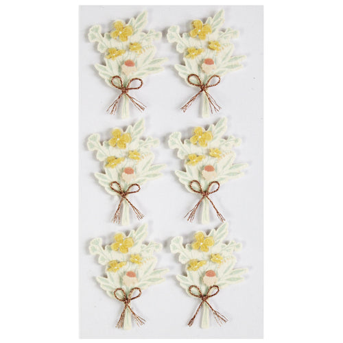 Six "Artoz 3D Sticker Blumenstrauss" d'Artoz Papier AG, disposés en deux colonnes sur fond blanc, chacun avec des fleurs jaunes, des feuilles vertes et un nœud marron - parfaits comme accents d'autocollants 3D dans un design suisse authentique.