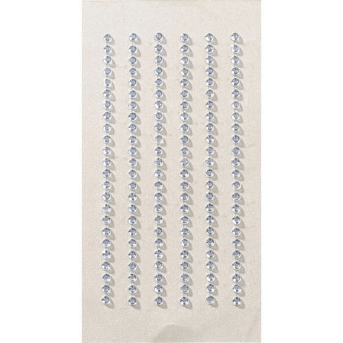 L'autocollant 3D "Kristall 3mm" d'Artoz Papier AG présente des strass adhésifs transparents en rangées verticales sur une feuille rectangulaire claire, idéale pour donner à vos travaux manuels un effet d'autocollant 3D étincelant.