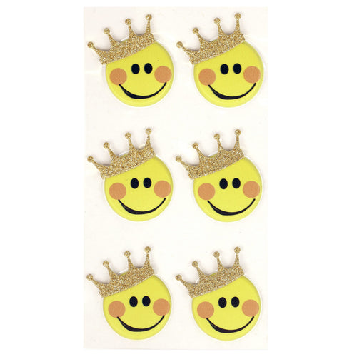 Six smileys jaunes avec des joues roses et des couronnes de paillettes dorées, disposés en deux colonnes sur fond blanc - un adorable set d'Artoz 3D Sticker "Smiley" d'Artoz Papier AG avec Schweizer Design.