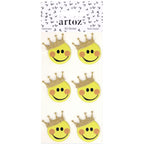 Sechs gelbe Smiley-Sticker mit glitzernden goldenen Kronen sind in zwei Reihen auf einer weissen Karte mit der Aufschrift "Artoz 3D Sticker 'Smiley'" der Artoz Papier AG in handwerklichem Schweizer Design angeordnet.