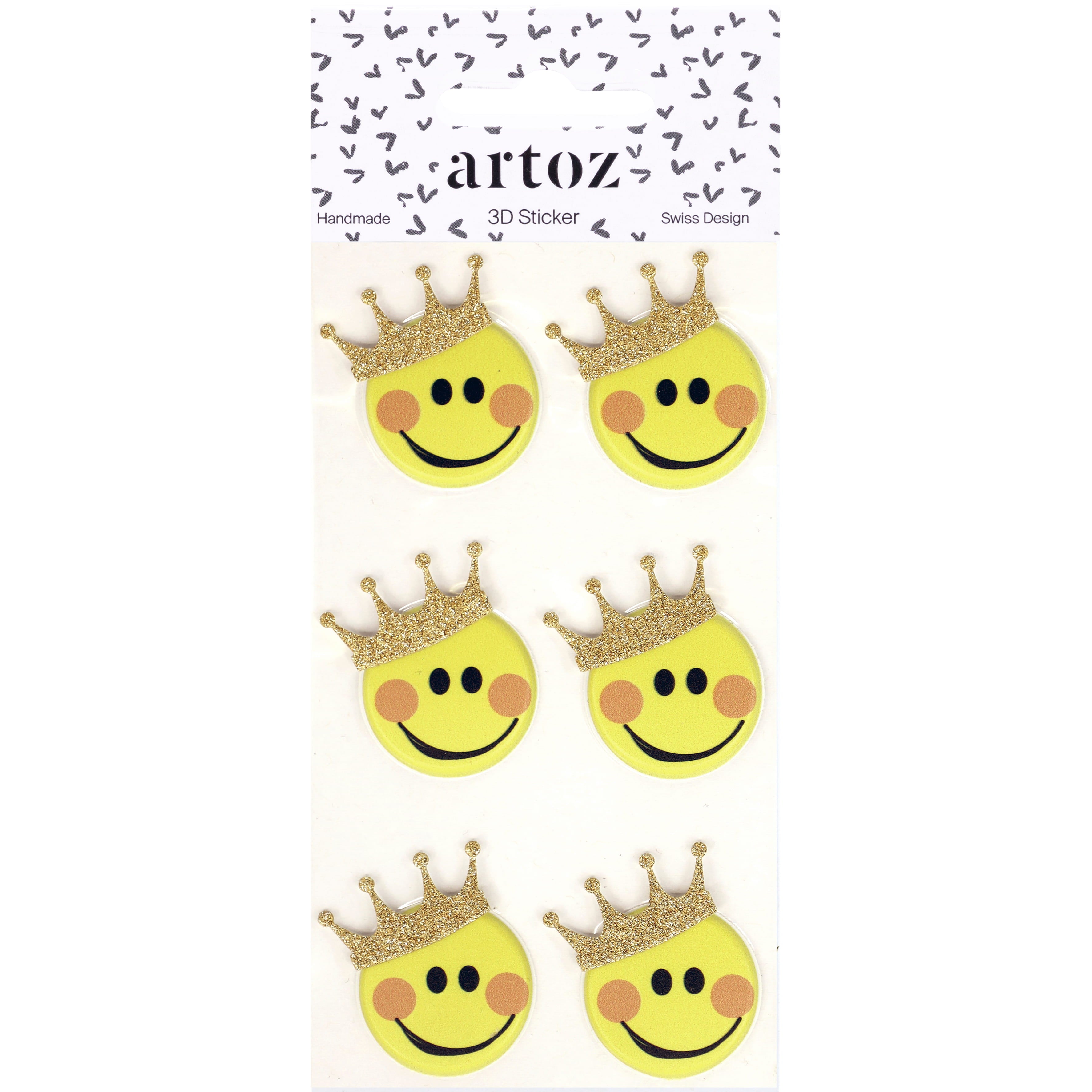 Six smileys jaunes avec des couronnes dorées scintillantes sont disposés en deux rangées sur une carte blanche étiquetée "Artoz 3D Sticker 'Smiley'" par Artoz Papier AG, une entreprise suisse de conception artisanale.