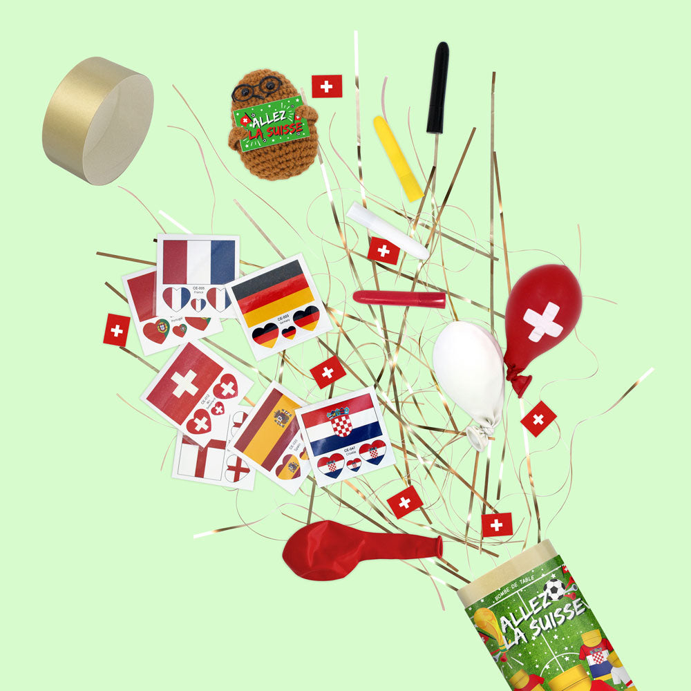 Un "Tischbombe ohne Feuer - Fussball WM Team Schweiz" vert d'Artoz Papier AG est orné d'autocollants du drapeau suisse, de drapeaux de pays européens, de ballons rouges et blancs et de nachhaltige Partydeko sur un fond vert clair.