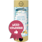 La bombe de table Artoz Papier AG Tischbombe ohne Feuer - Welcome Baby Boy est une bombe de table réutilisable bleue et jaune avec un badge "Wiederverwendbar", qui offre un décor sûr et festif pour les célébrations de la naissance d'un garçon.